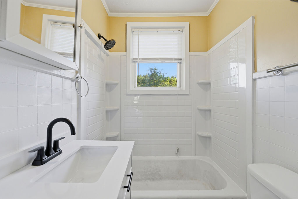 7604 Highway 252 Honea Path, SC 29654 - Photo 21 of 33 This bright bathroom features crisp white tile and a functional design, ready for your personal touch.