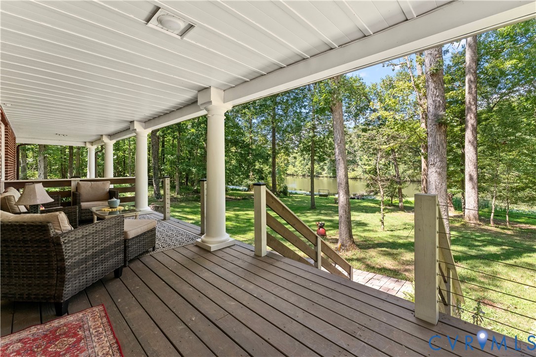 1159 Cedar Hill Road Blackstone, VA 23824 - Photo 2 of 45 a living room with large windows