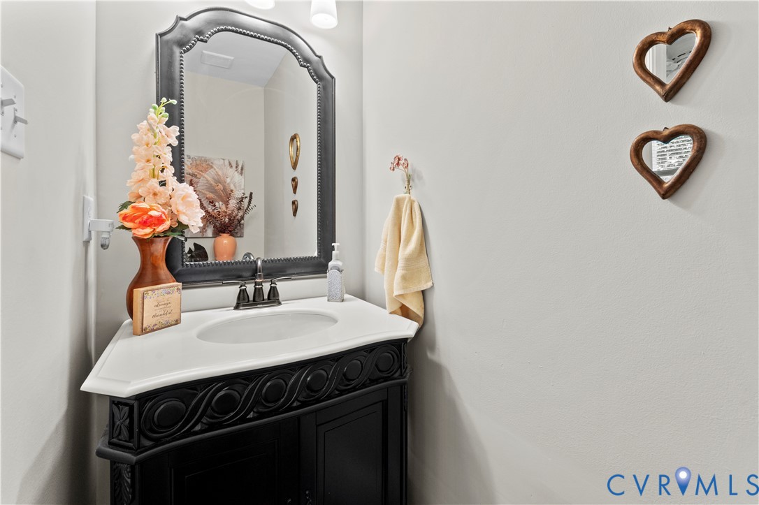 1159 Cedar Hill Road Blackstone, VA 23824 - Photo 21 of 45 a bathroom with a sink and a mirror