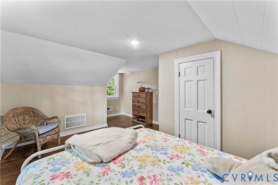 1159 Cedar Hill Road Blackstone, VA 23824 - Photo 29 of 45 a bedroom with a bed dresser and a window