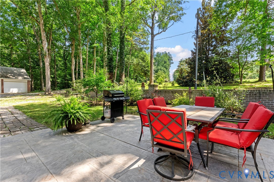 1159 Cedar Hill Road Blackstone, VA 23824 - Photo 40 of 45 a view of a chairs and table in the patio