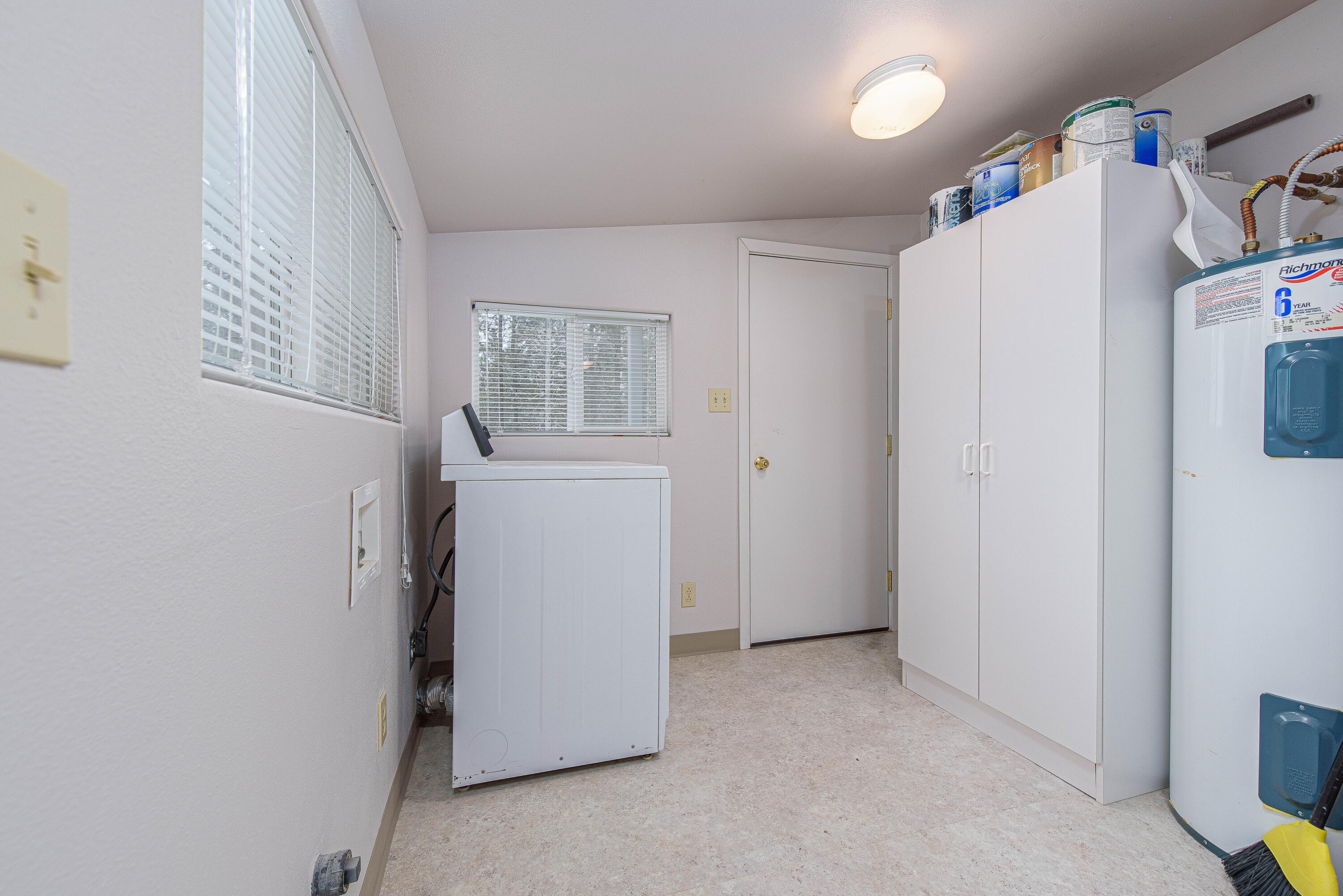 138722 Rhododendron Street Gilchrist, OR 97737 - Photo 21 of 36 a view of a storage & utility room with closet window