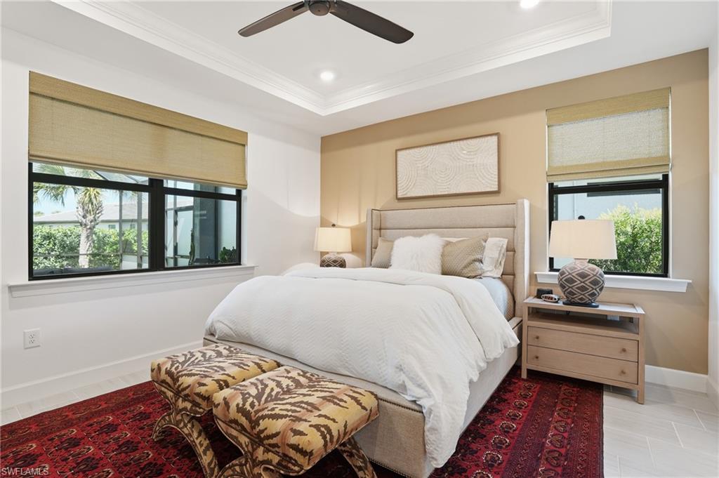 1955 Sierra Court Naples, FL 34120 - Photo 17 of 50 a bedroom with a bed and a window