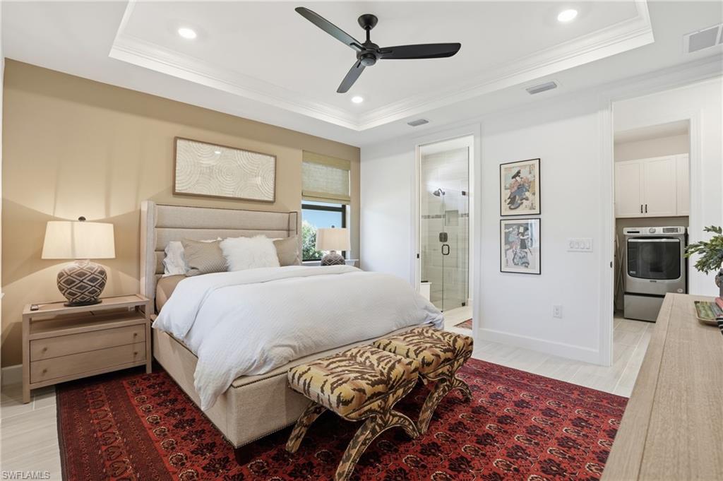 1955 Sierra Court Naples, FL 34120 - Photo 18 of 50 a bedroom with a bed and wooden floor