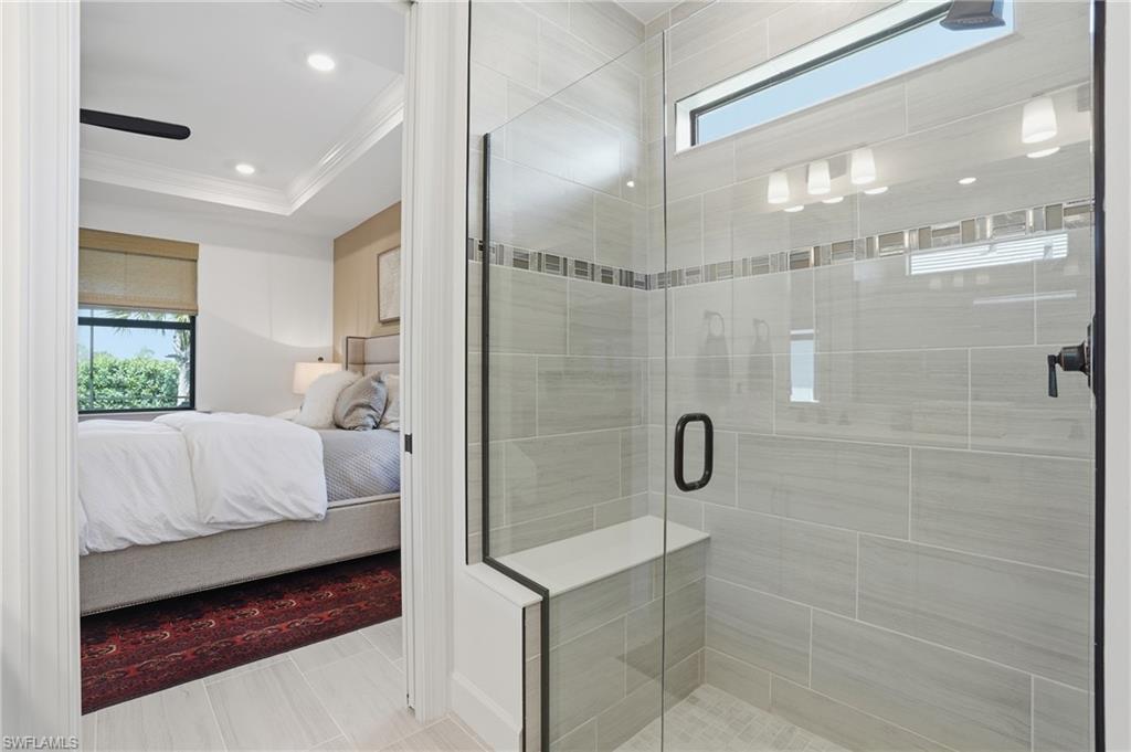 1955 Sierra Court Naples, FL 34120 - Photo 20 of 50 a bathroom with a shower and a sink