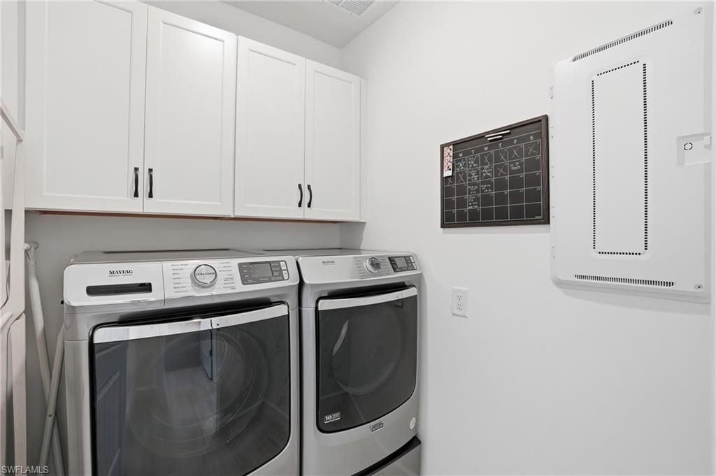 1955 Sierra Court Naples, FL 34120 - Photo 24 of 50 a utility room with dryer and washer