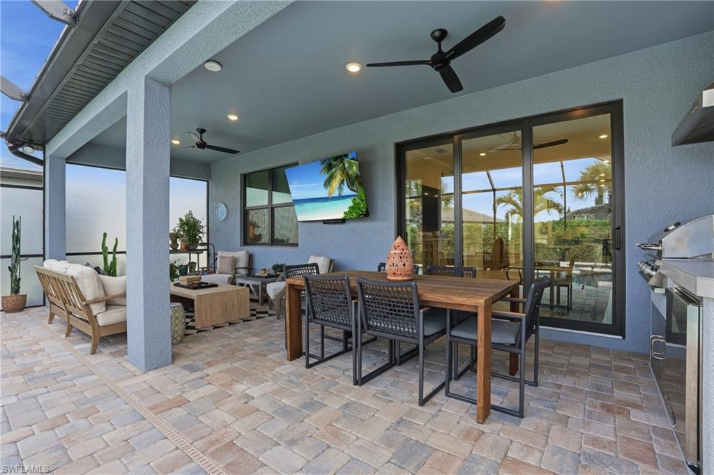 1955 Sierra Court Naples, FL 34120 - Photo 29 of 50 a view of a dining room with furniture window and outside view