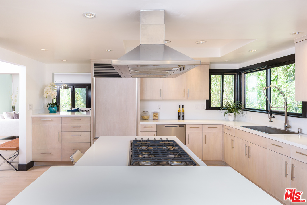2663 Desmond Estates Road Los Angeles, CA 90046 - Photo 11 of 27 a kitchen with a sink stove and refrigerator