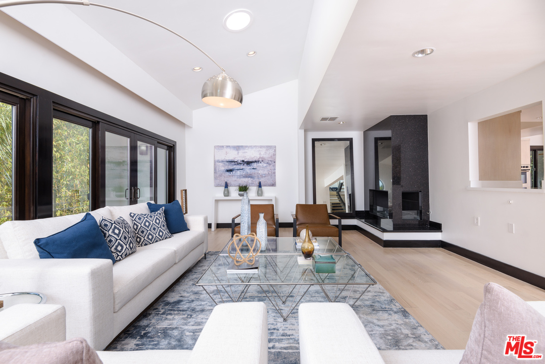 2663 Desmond Estates Road Los Angeles, CA 90046 - Photo 6 of 27 a living room with furniture and a large window