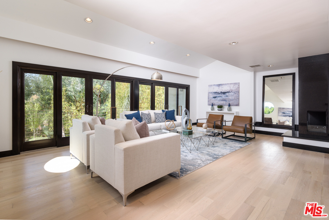 2663 Desmond Estates Road Los Angeles, CA 90046 - Photo 7 of 27 a living room with furniture and a large window