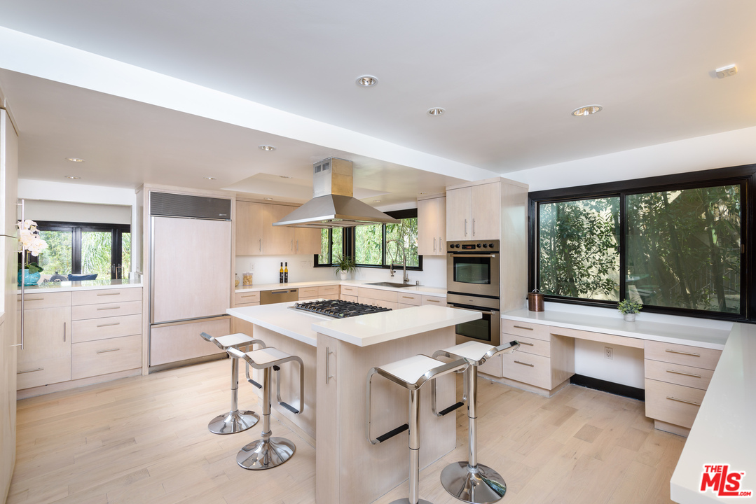 2663 Desmond Estates Road Los Angeles, CA 90046 - Photo 10 of 27 a view of a dining room with furniture window and outside view