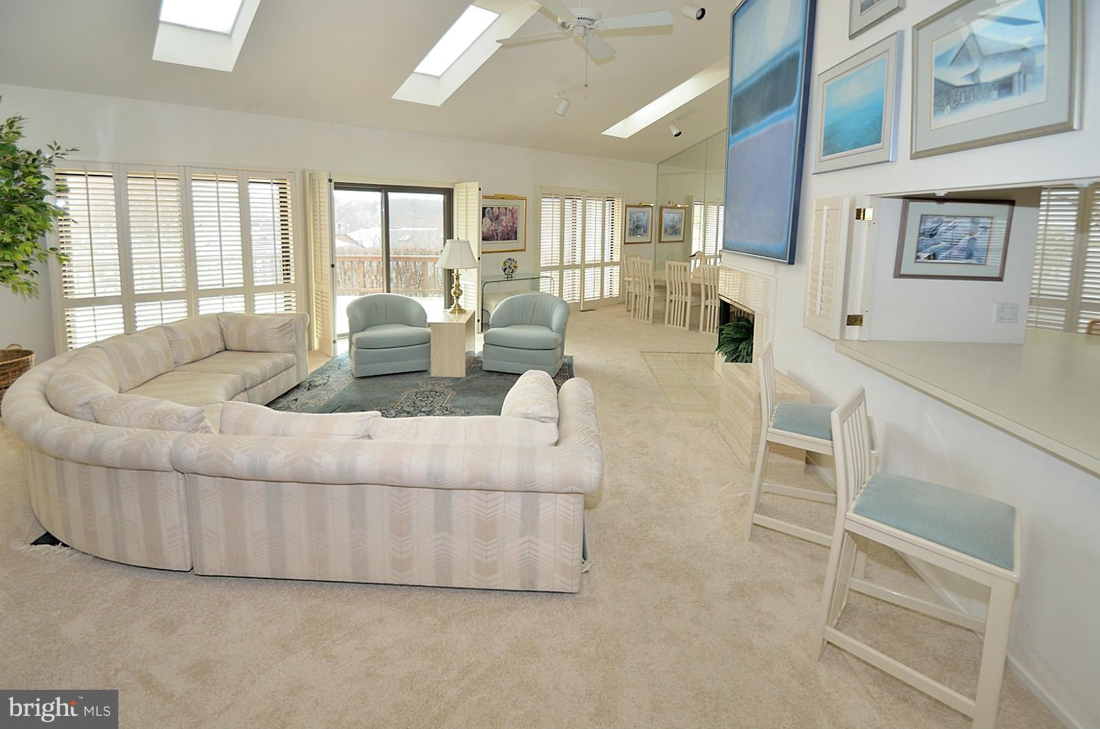 2111 South Bay Lane Reston, VA 20191 - Photo 4 of 30 a living room with furniture and a large window