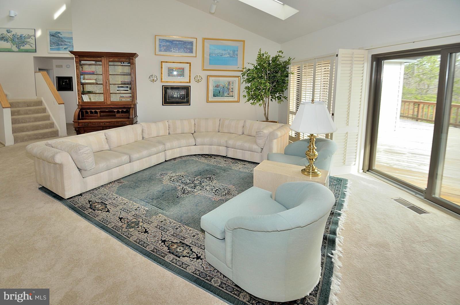 2111 South Bay Lane Reston, VA 20191 - Photo 6 of 30 a living room with furniture and a large window