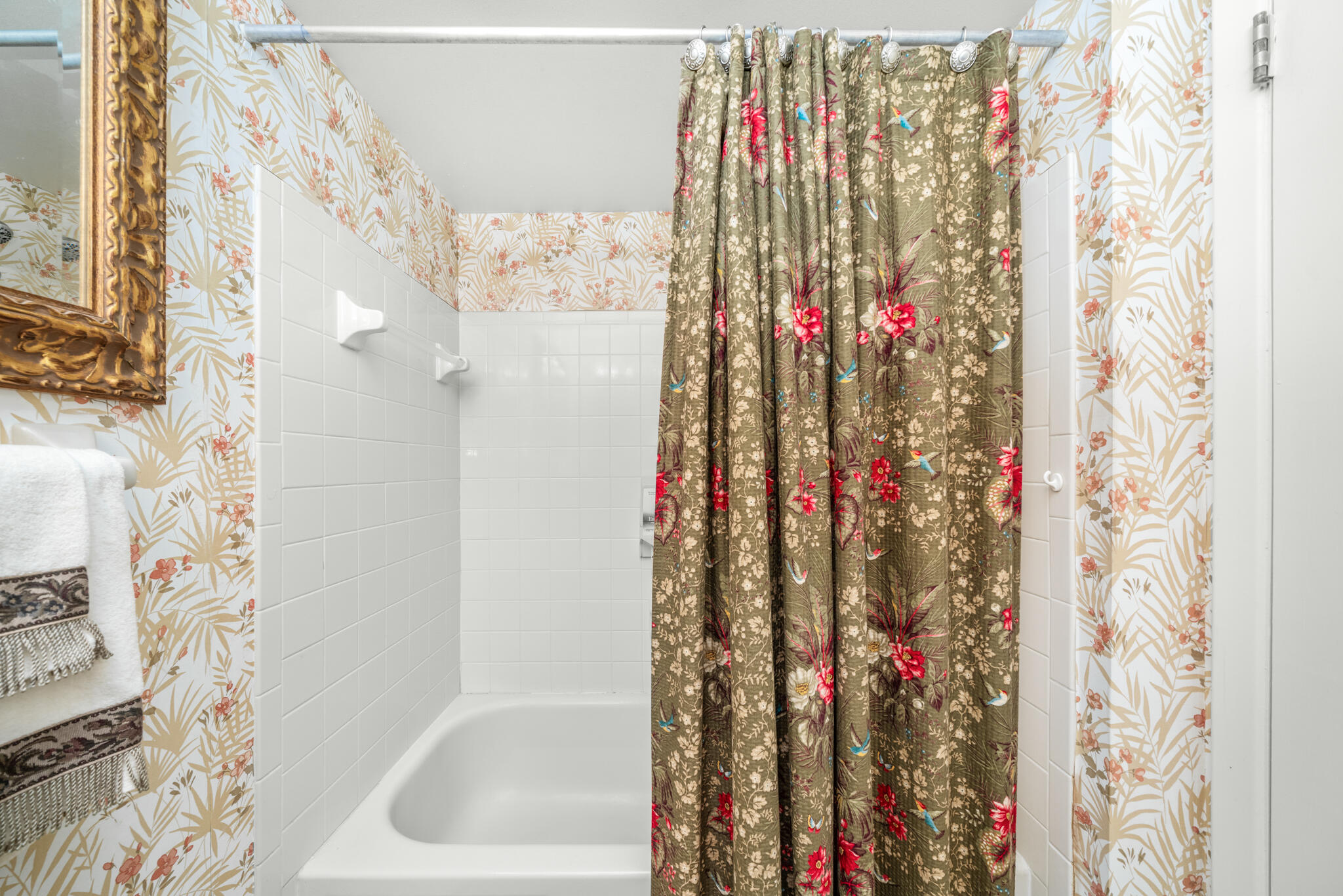 3833 Edgewater Drive Sebring, FL 33872 - Photo 22 of 51 a bathroom with a shower curtain and a curtain