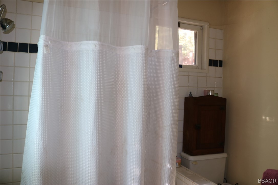 39372 Cedar Dell Road Fawnskin, CA 92333 - Photo 11 of 18 a view of closet