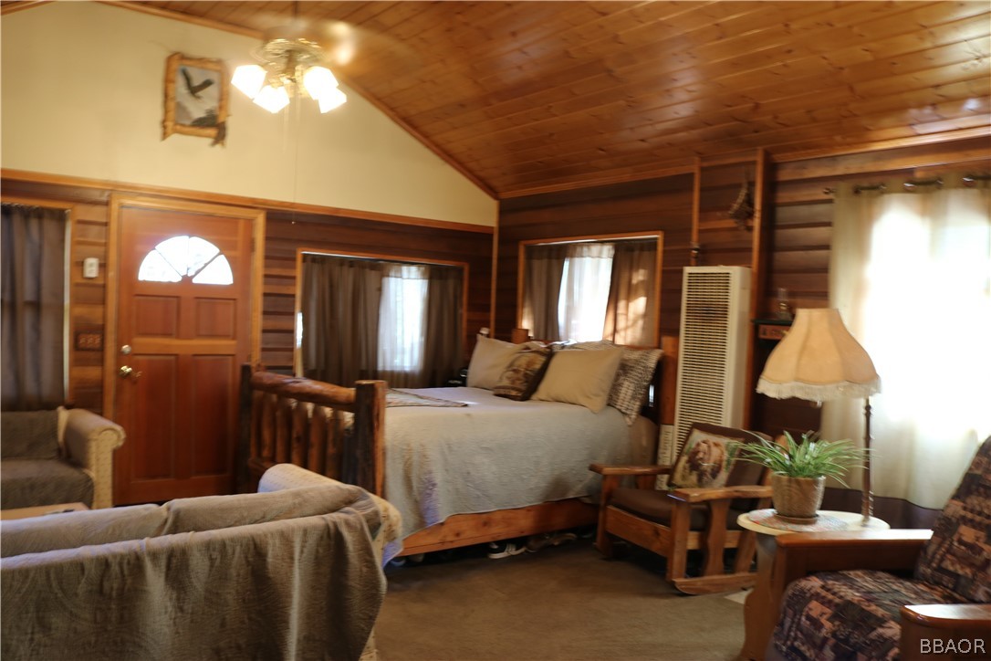 39372 Cedar Dell Road Fawnskin, CA 92333 - Photo 5 of 18 a bedroom with bed and a window