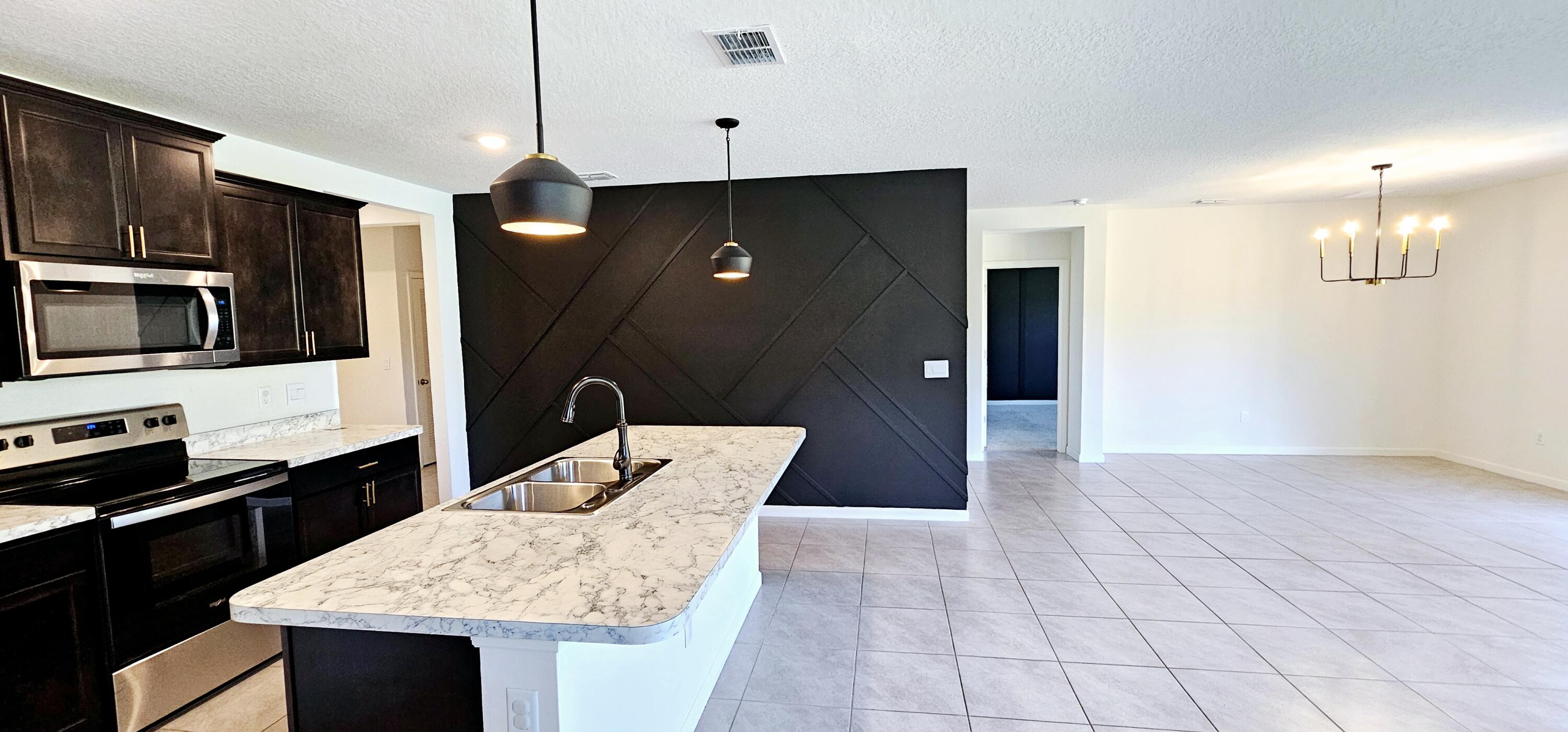 3723 Sandhill Crane Circle Mims, FL 32754 - Photo 4 of 22 20240307_133700