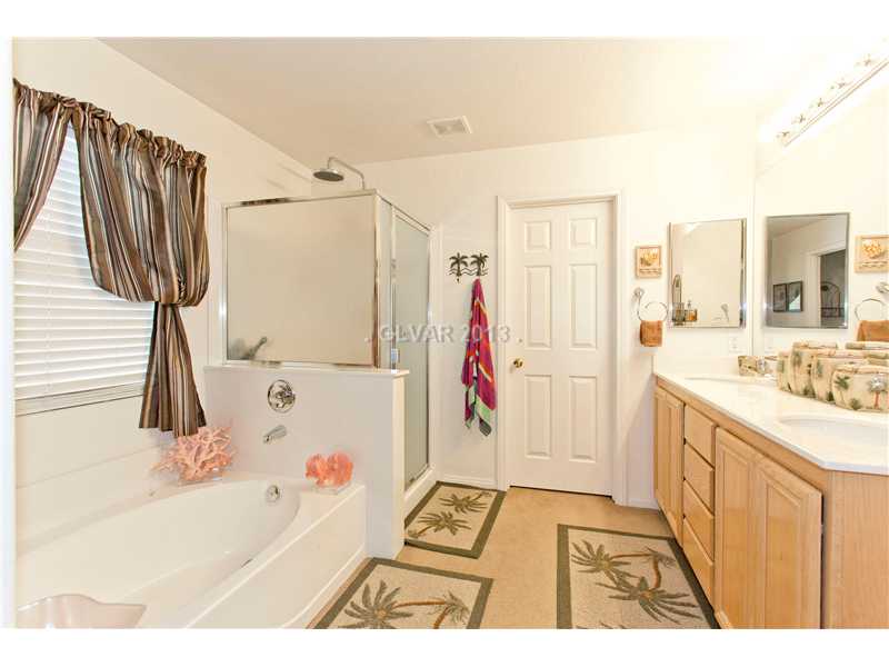7901 Midnight Ride Street Las Vegas, NV 89131 - Photo 17 of 24 Master Bath/Spa. Luxuriate in the oversized Roman style tub! Separate shower as well!