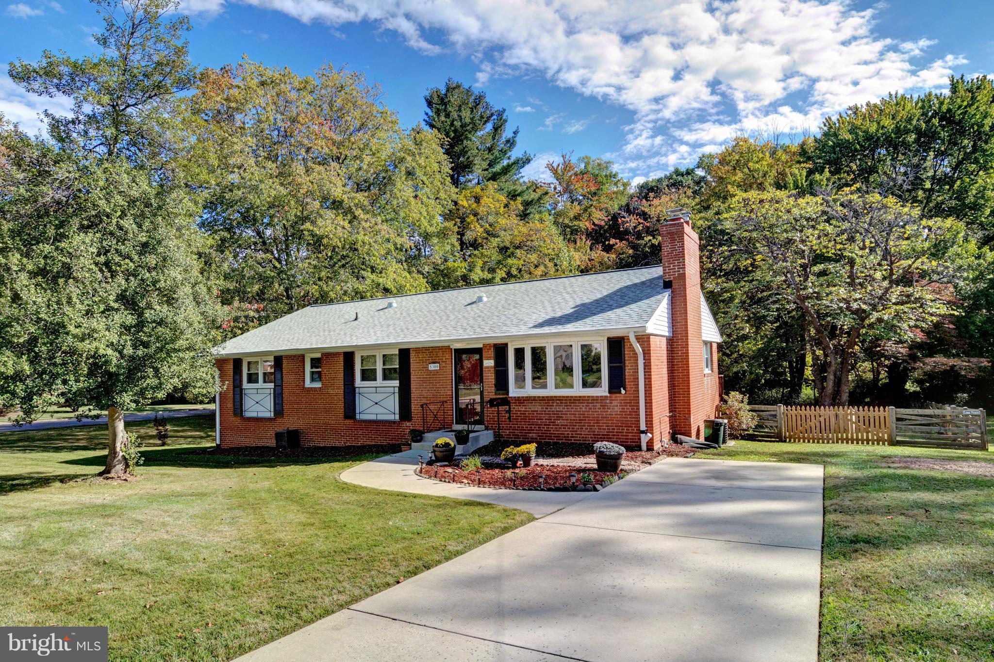 5300 Ravensworth Road Springfield, VA 22151 - Photo 2 of 28 a view of a house with backyard and sitting area