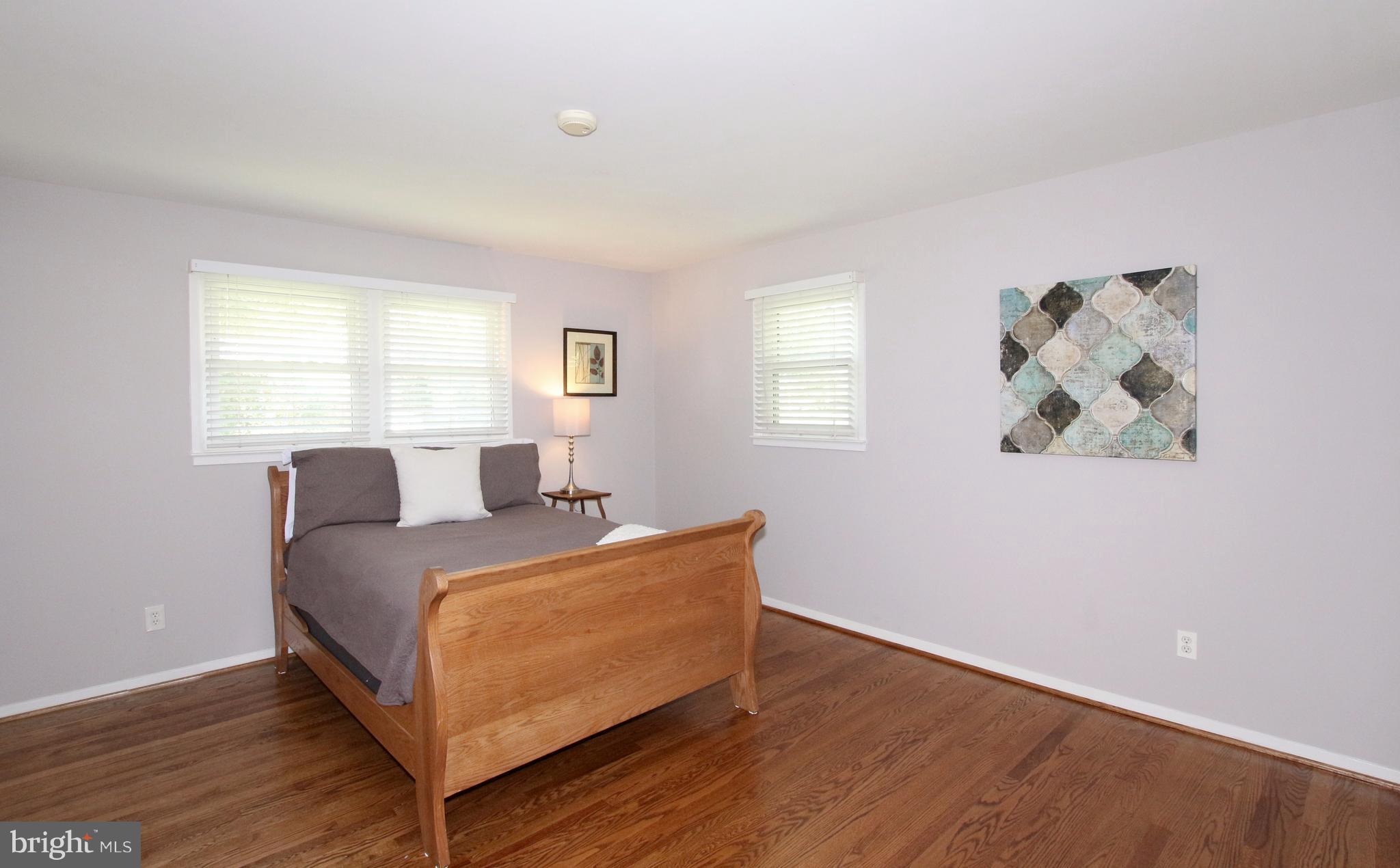 5300 Ravensworth Road Springfield, VA 22151 - Photo 15 of 28 a bedroom with a bed and window
