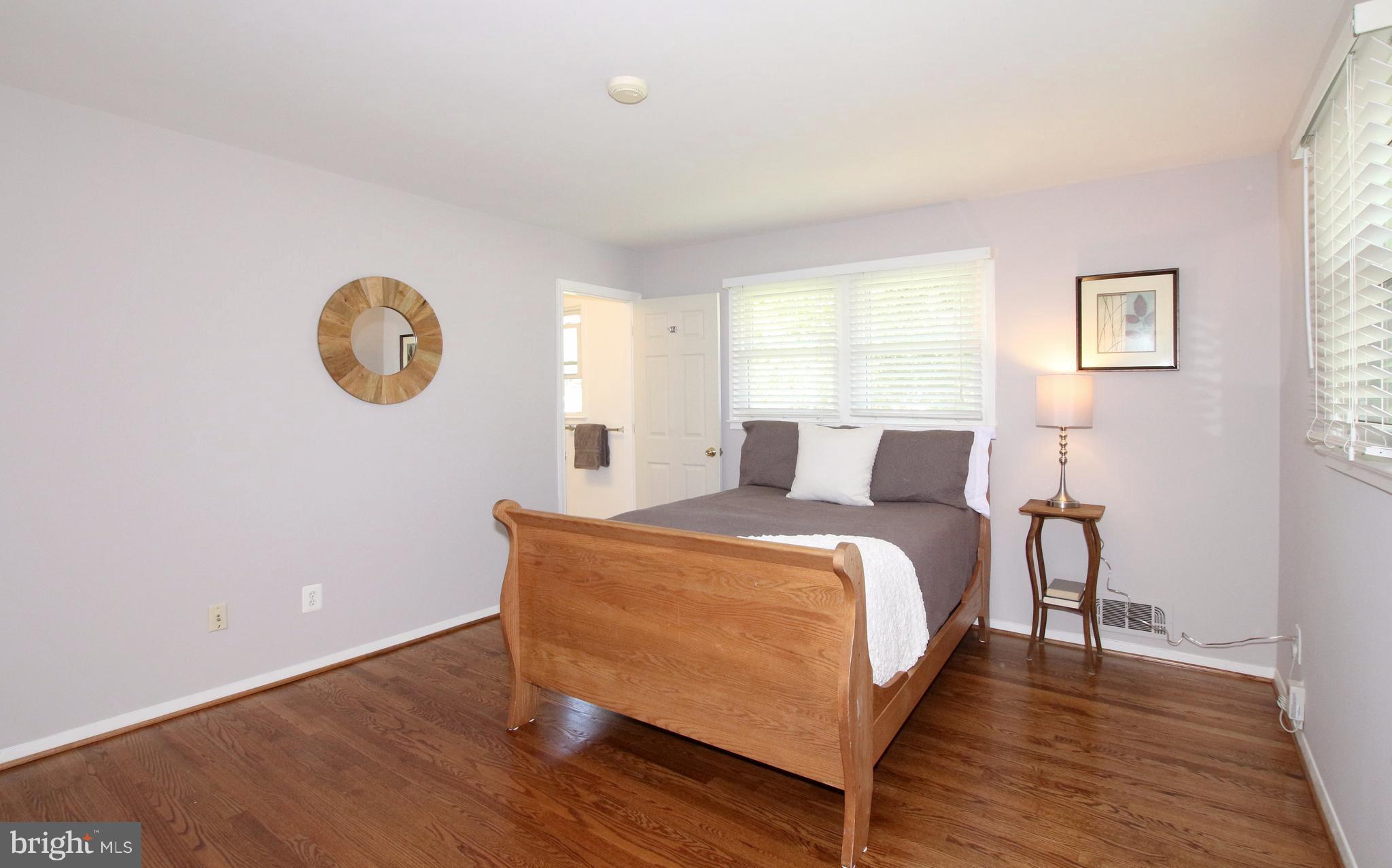 5300 Ravensworth Road Springfield, VA 22151 - Photo 16 of 28 a bed room with a bed and a window