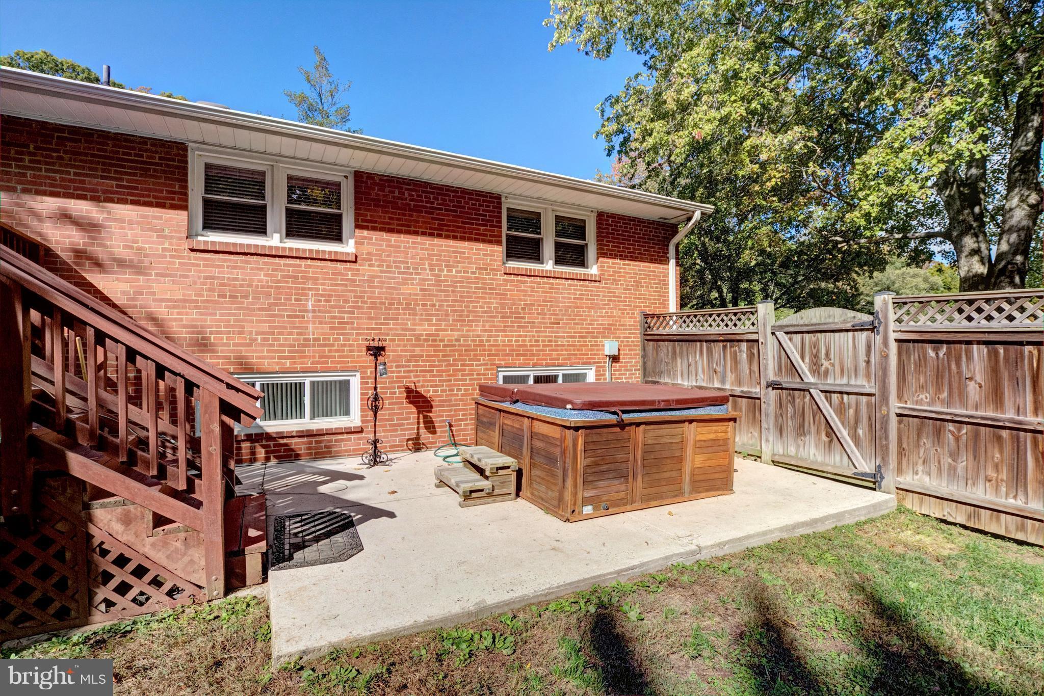 5300 Ravensworth Road Springfield, VA 22151 - Photo 25 of 28 a view of a house with pool and chairs