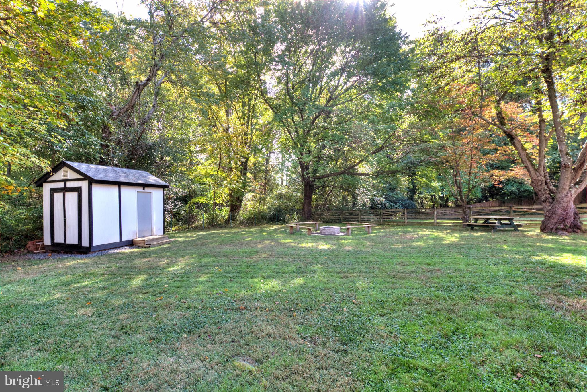 5300 Ravensworth Road Springfield, VA 22151 - Photo 27 of 28 a view of a backyard with large trees