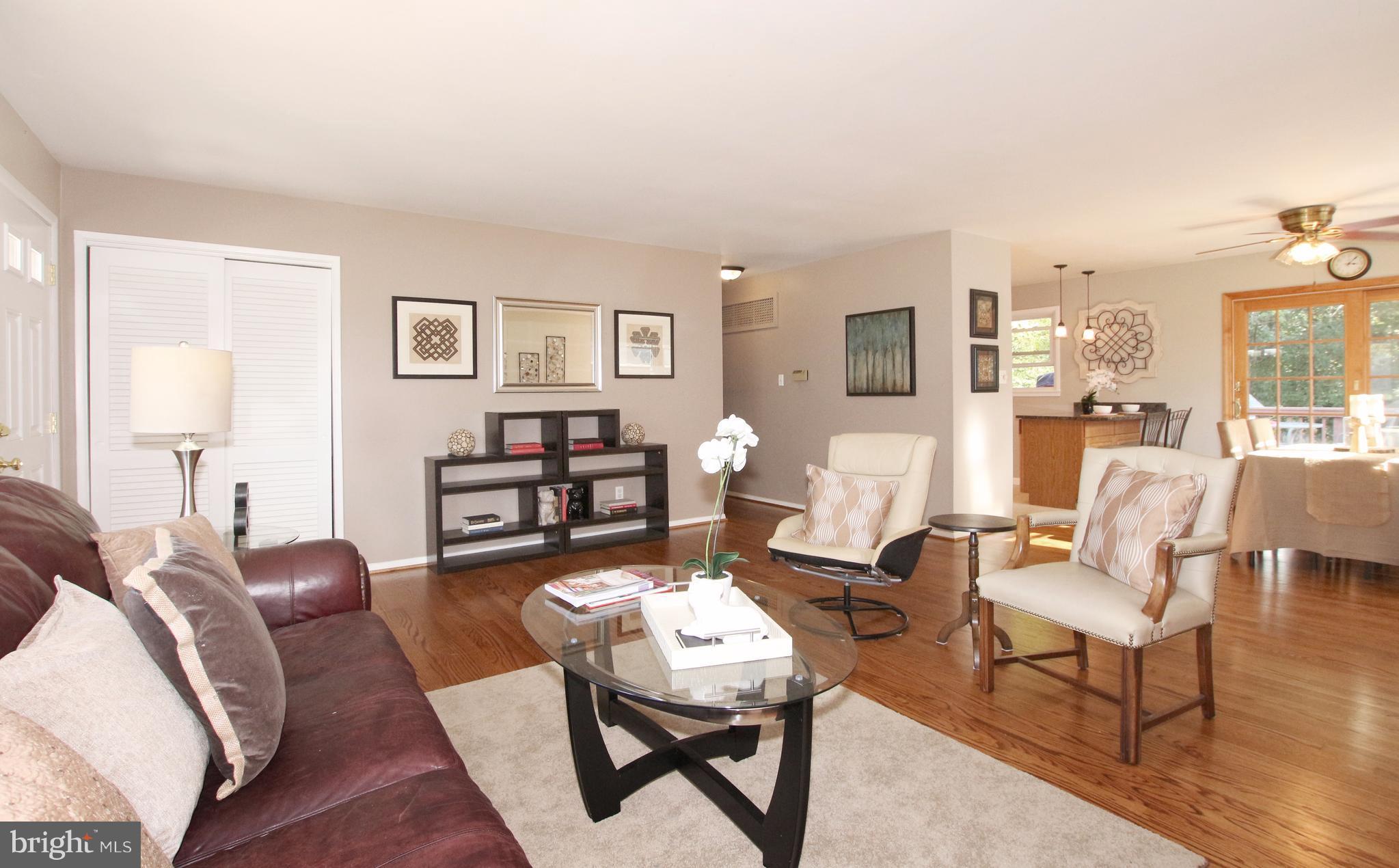 5300 Ravensworth Road Springfield, VA 22151 - Photo 10 of 28 a living room with furniture and a wooden floor