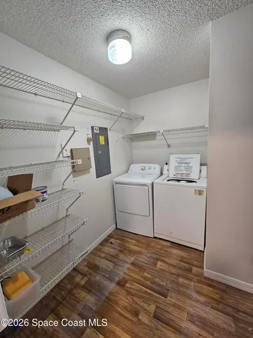 a utility room with cabinets