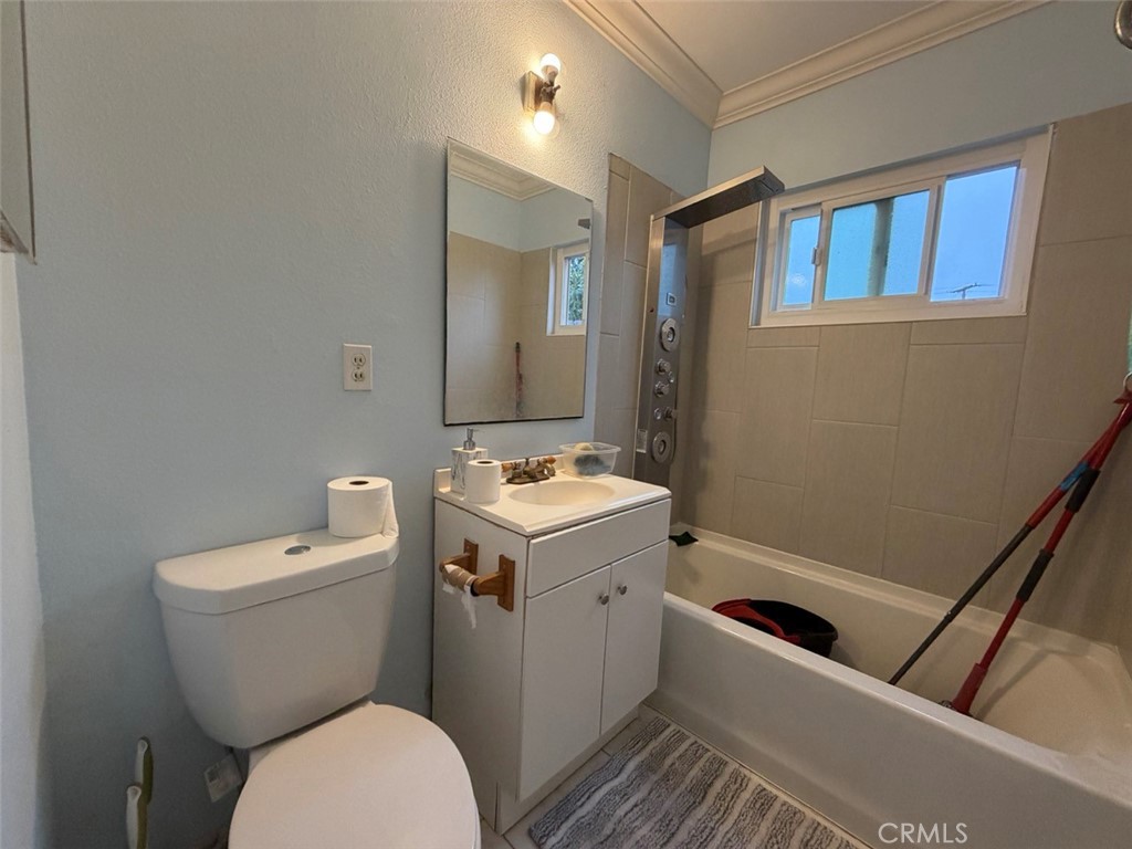 22706 Rashdall Avenue Carson, CA 90745 - Photo 17 of 32 a bathroom with a sink and mirror with toilet