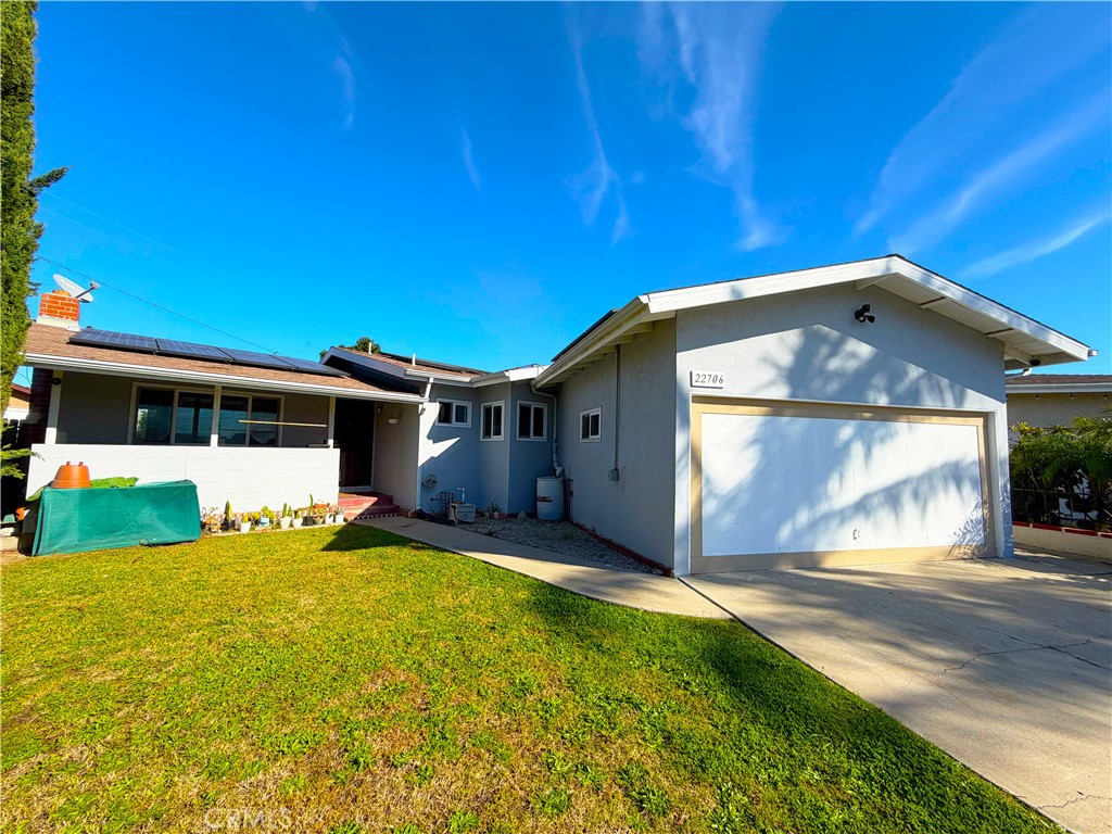 22706 Rashdall Avenue Carson, CA 90745 - Photo 3 of 32 a front view of a house with a yard
