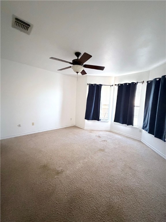 5214 Spring Brook Drive Corpus Christi, TX 78413 - Photo 12 of 12 a view of a livingroom with a ceiling fan and window