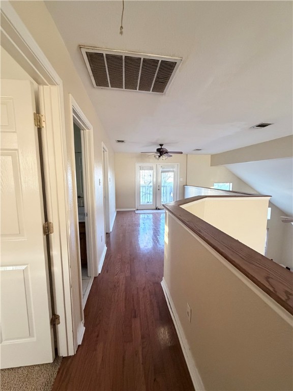 5214 Spring Brook Drive Corpus Christi, TX 78413 - Photo 9 of 12 a view of a hallway with wooden floor and staircase