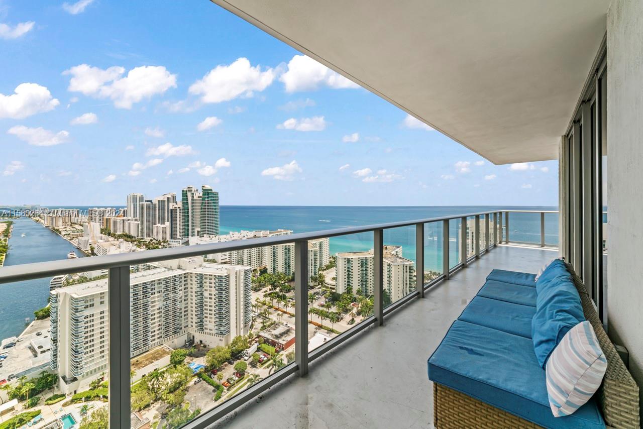 4010 South Ocean Drive, Unit R3001 Hollywood, FL 33019 - Photo 24 of 44 a view of balcony with wooden floor