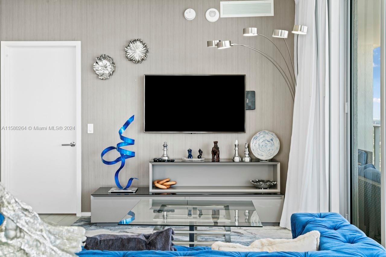 4010 South Ocean Drive, Unit R3001 Hollywood, FL 33019 - Photo 9 of 44 a bathroom with a sink and a mirror