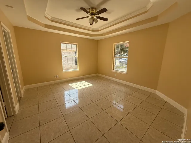 a view of an empty room and window
