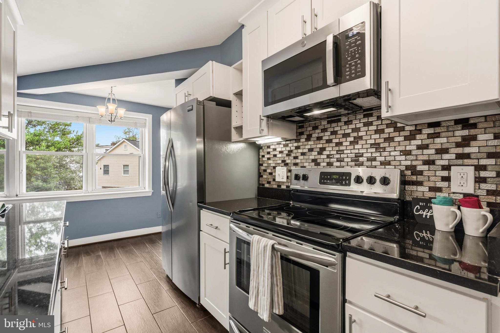 7034 Strathmore Street, Unit 306 Chevy Chase, MD 20815 - Photo 8 of 23 Kitchen