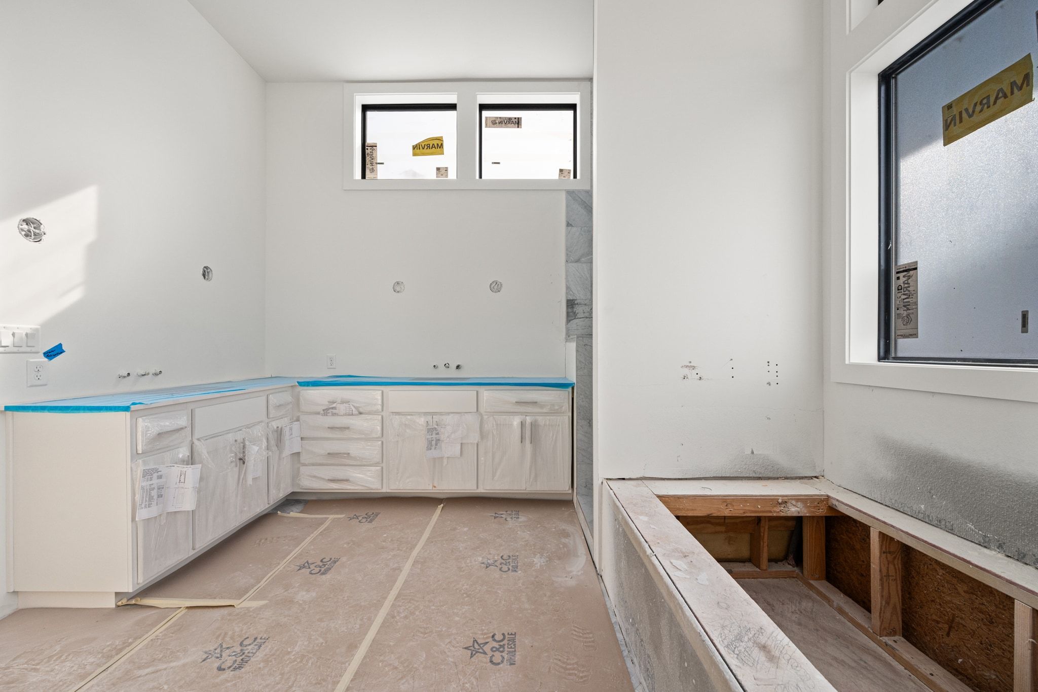 1408 West 9th Street, Unit 801 Austin, TX 78703 - Photo 11 of 18 a kitchen with granite countertop white cabinets and white appliances