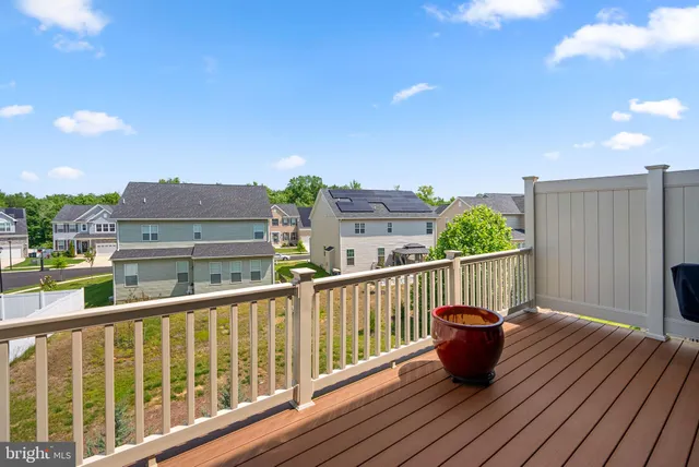 a view of balcony with furniture