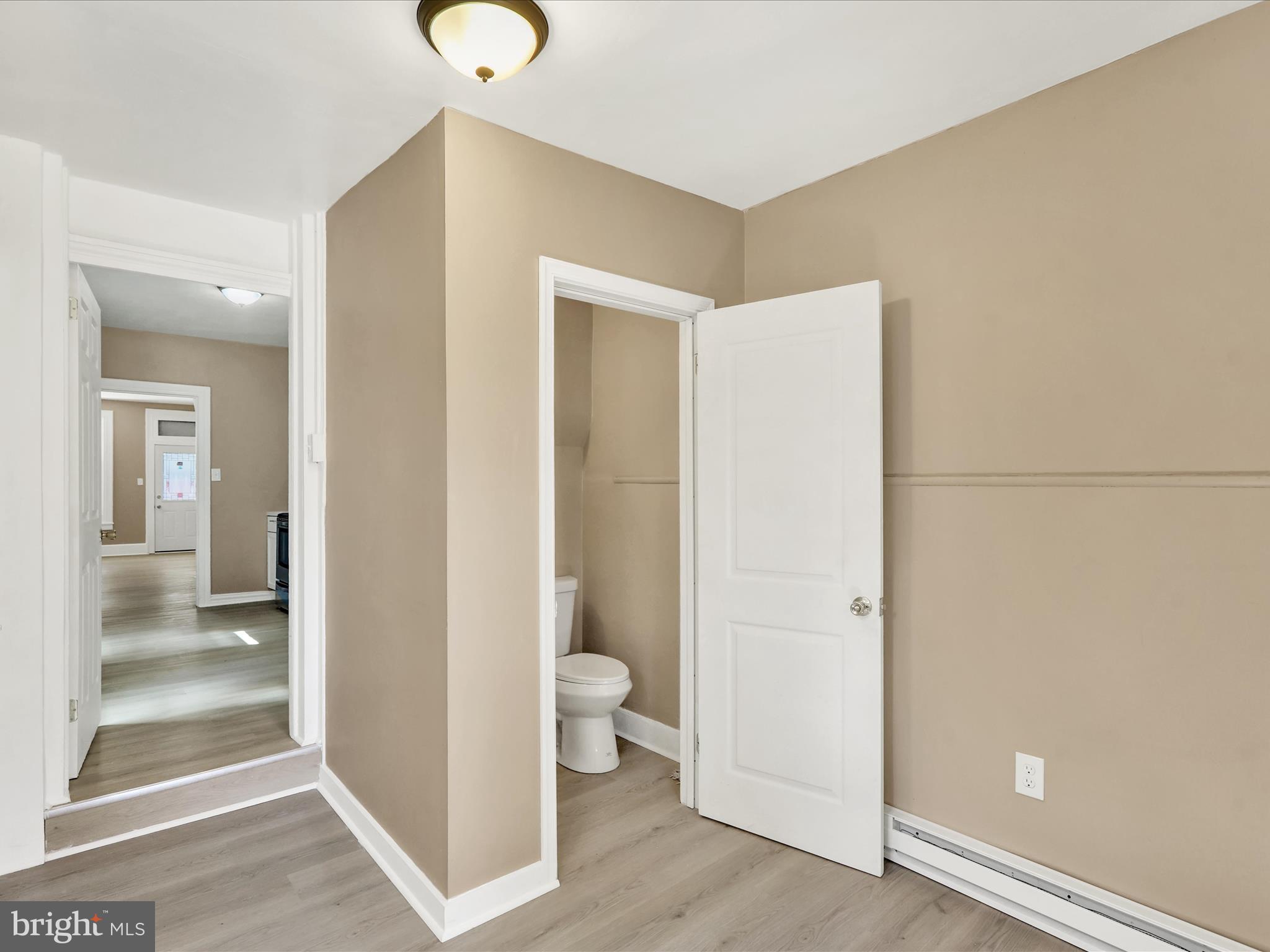 541 South 11th Street Reading, PA 19602 - Photo 14 of 24 a view of an empty room and wooden floor