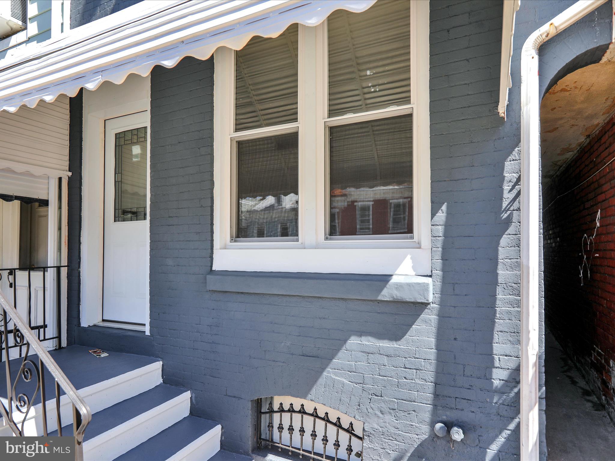541 South 11th Street Reading, PA 19602 - Photo 4 of 24 a view of a house with a large window