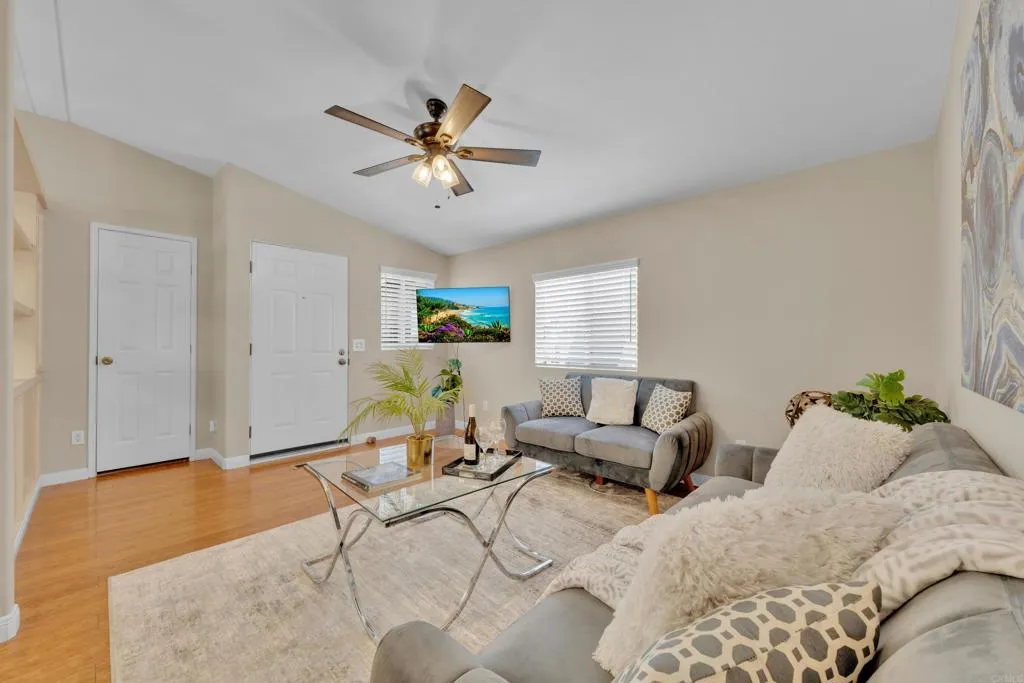 1815 Sweetwater Road, Unit 169 Spring Valley, CA 91977 - Photo 12 of 50 a living room with furniture and a window