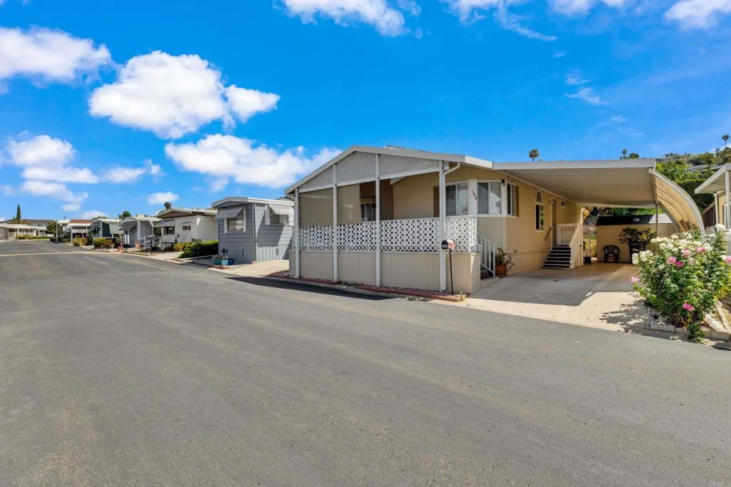 1815 Sweetwater Road, Unit 169 Spring Valley, CA 91977 - Photo 2 of 50 a view of a house with a road