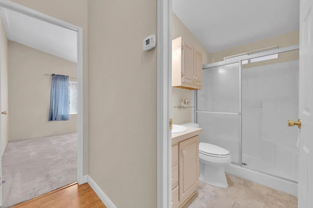 1815 Sweetwater Road, Unit 169 Spring Valley, CA 91977 - Photo 29 of 50 a bathroom with a toilet and a shower