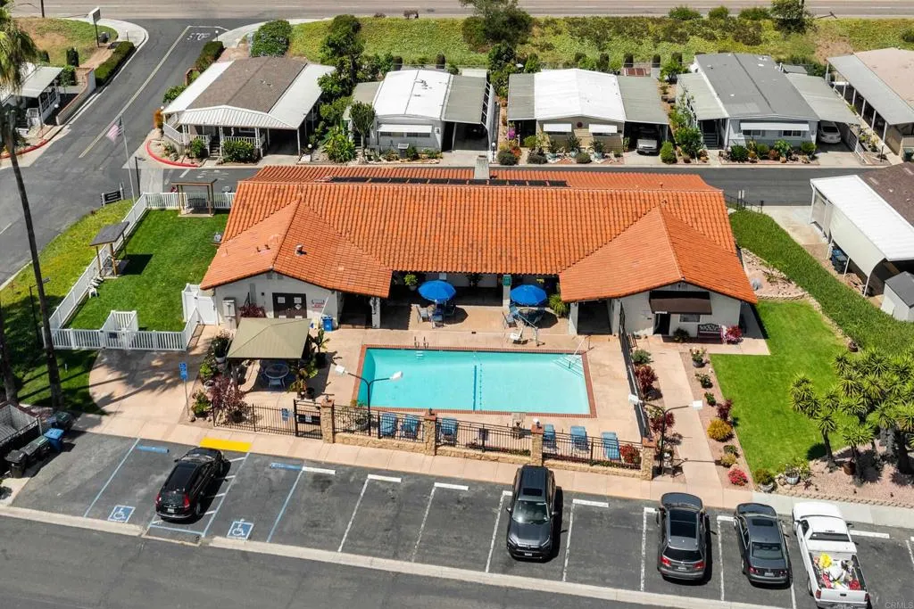 1815 Sweetwater Road, Unit 169 Spring Valley, CA 91977 - Photo 45 of 50 an aerial view of multiple houses with swimming pool