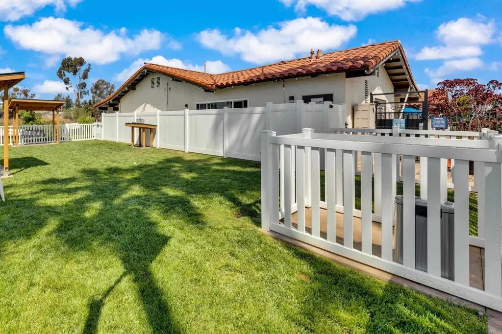 1815 Sweetwater Road, Unit 169 Spring Valley, CA 91977 - Photo 47 of 50 a front view of a house with garden