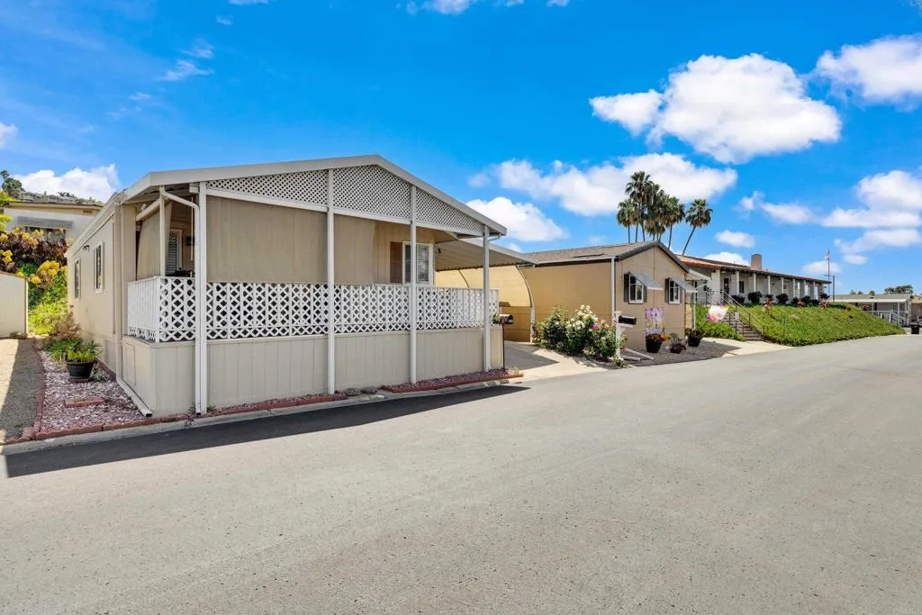 1815 Sweetwater Road, Unit 169 Spring Valley, CA 91977 - Photo 5 of 50 a front view of a house with a yard