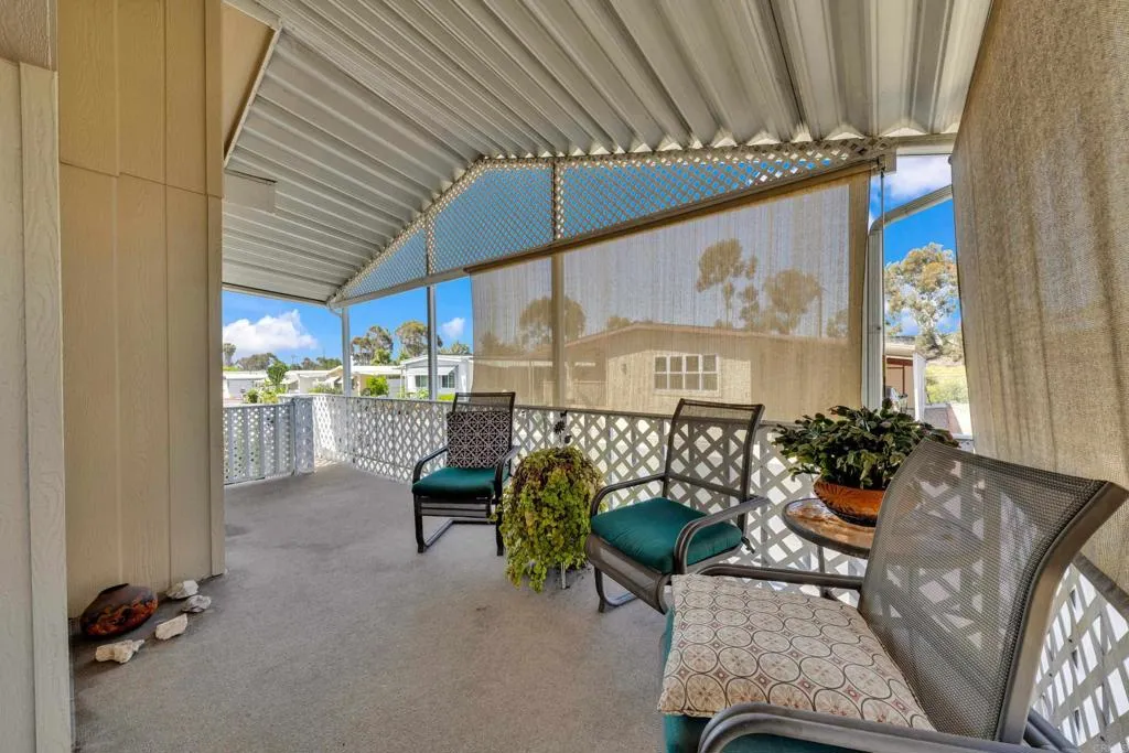 1815 Sweetwater Road, Unit 169 Spring Valley, CA 91977 - Photo 10 of 50 a room with furniture and a table
