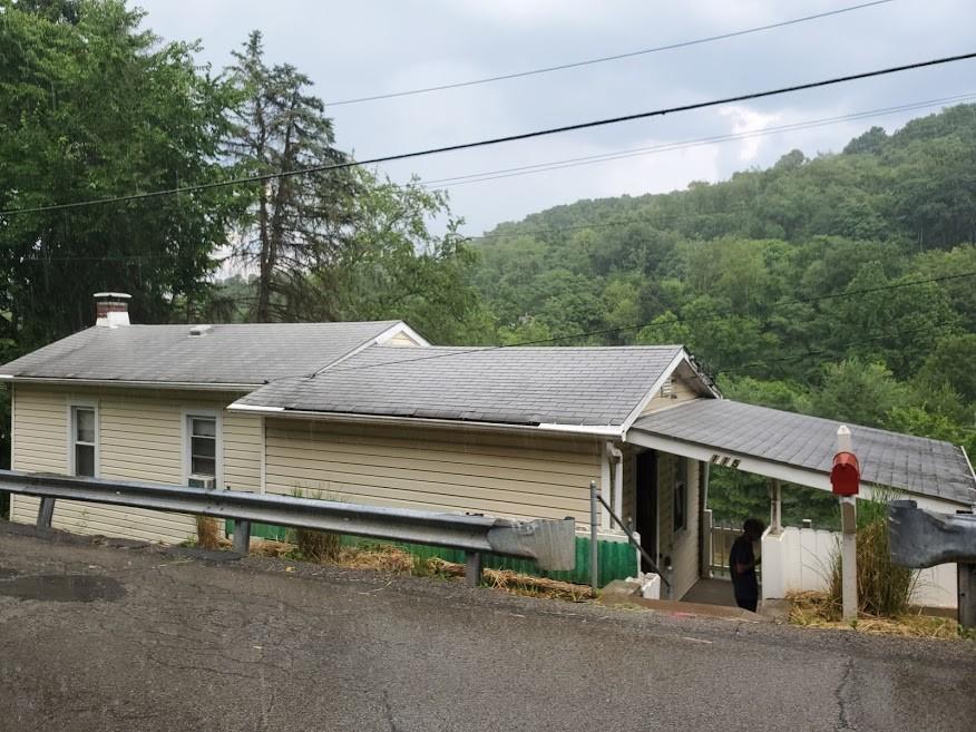 115 Morgan Hill Road Morgan, PA 15064 - Photo 16 of 17 a view of a house with a street