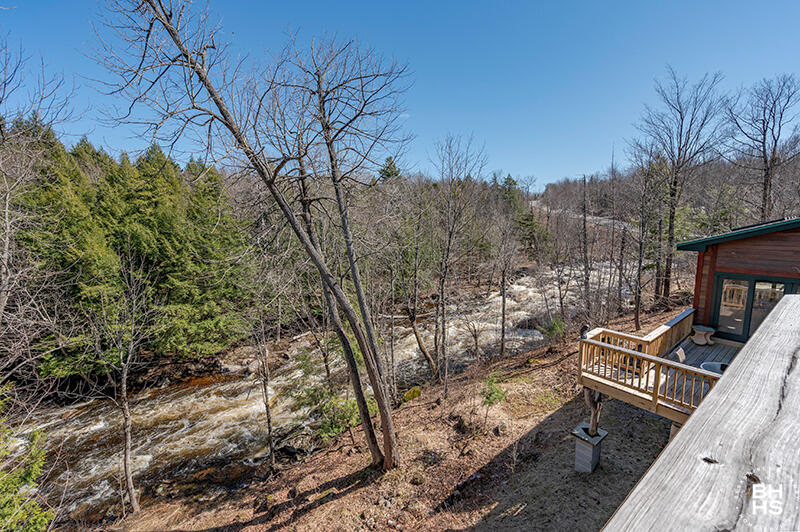 667 Days Mills Road St. Regis Falls, NY 12980 - Photo 45 of 51 HomeOnLakeOzoniaOutlet_GuestCottage_Deck